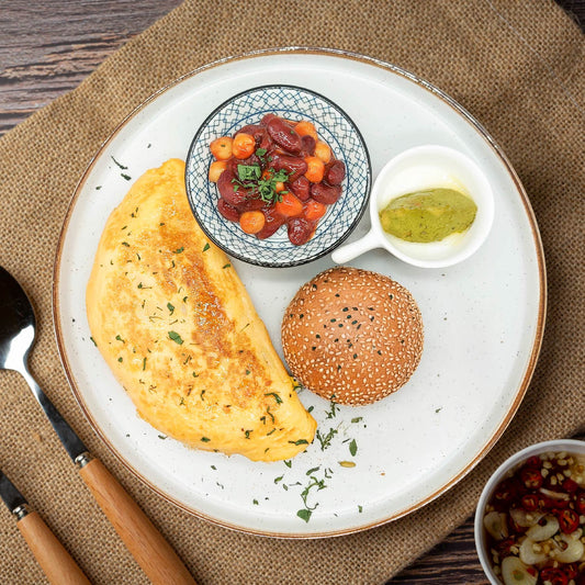 A. Spinach And Pork Omelette W/ Guacamole, Homemade Baked Beans & Sesame Roll - 04/09/25